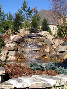 Water Feature Stone waterfall in Charlotte, NC landscape